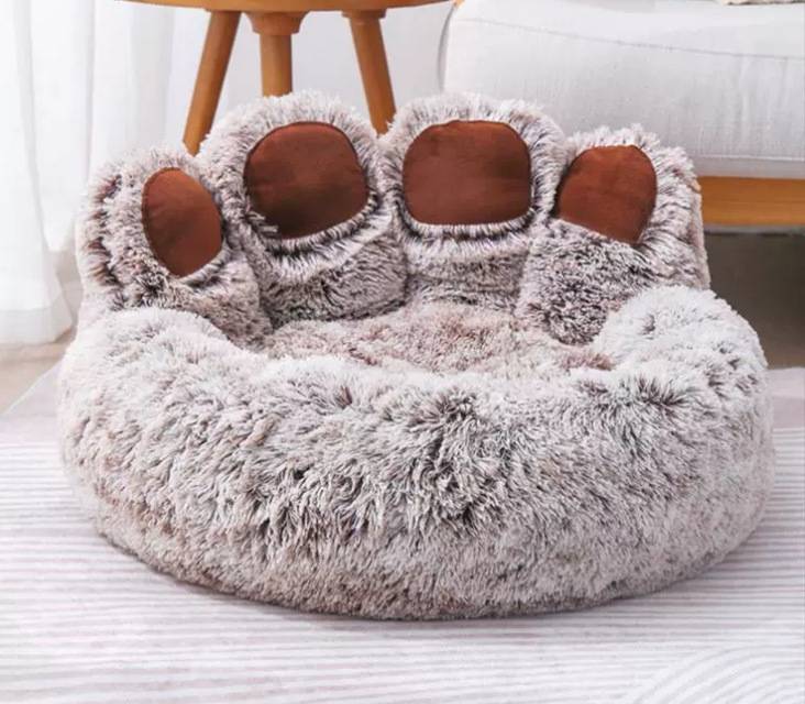 Fleurissaint cozy paw bed— a soft, furry haven made for snuggles, snoozes, and tail-wagging dreams. Designed with plush faux fur and a cushioned base, this bed feels like a warm hug for your four-legged best friend.